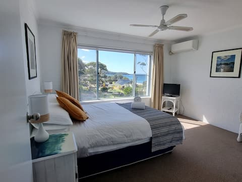 Successful Airbnb property: Beach views from a bright and sunny unit in Mollymook
