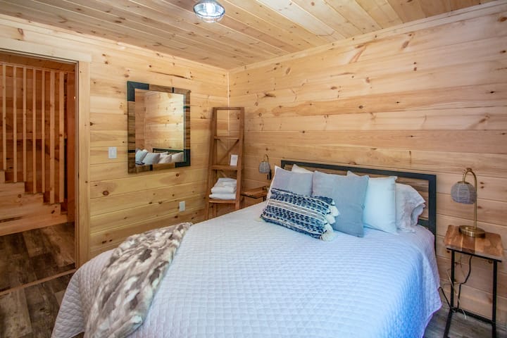 Bedroom 3 offers a queen-sized bed, providing comfortable accommodation for 2 guests.