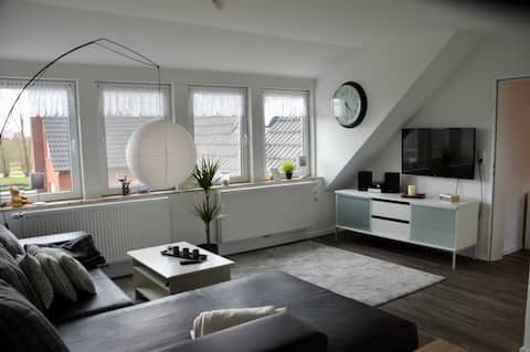 Top Airbnb: Bright upper apartment with balcony in Norden