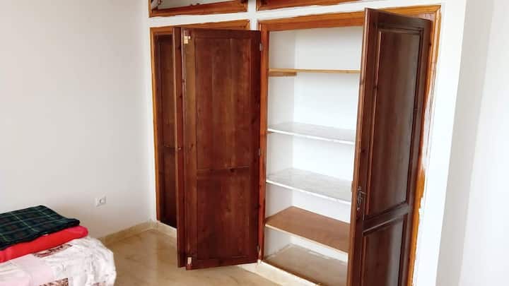 Bedroom 3 with single bed, large fitted wardrobe and sea views