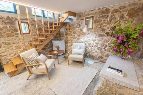 Old restored water mill with large jacuzzi