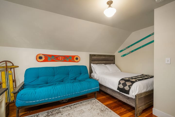 Bedroom 4 with bed and sofa lounge.