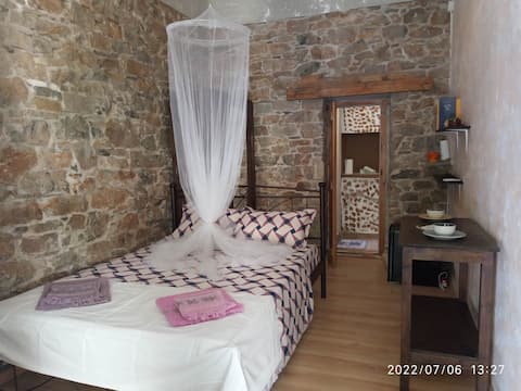 Stone built and cool, a few meters from the beach