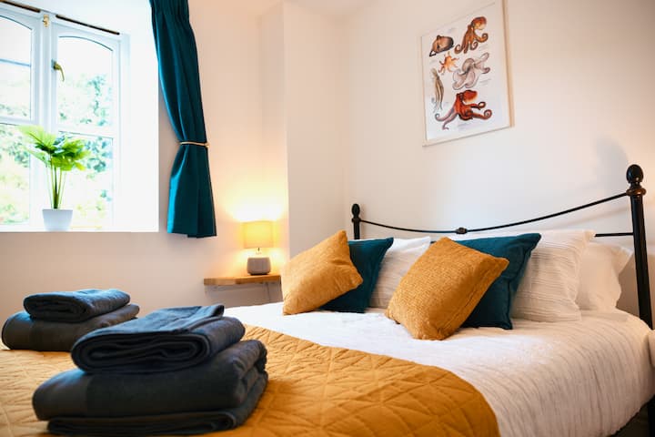 King sized beds, chest of drawers and clothes hangers makes for very comfy spaces for a great nights sleep!