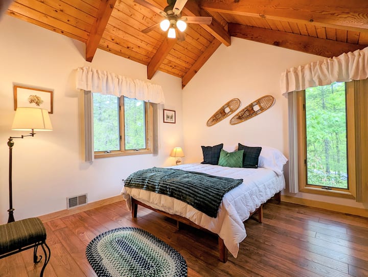 The upstairs "Winter Room" reminds us of our most cherished times in Sunapee. Featuring two closets, a skylight, and a small reading nook.