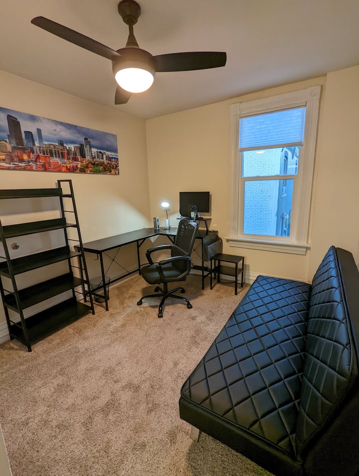 Sleeper couch in office for the occasional guest.