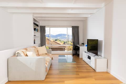 Renovated two-level Sandy Bay apartment