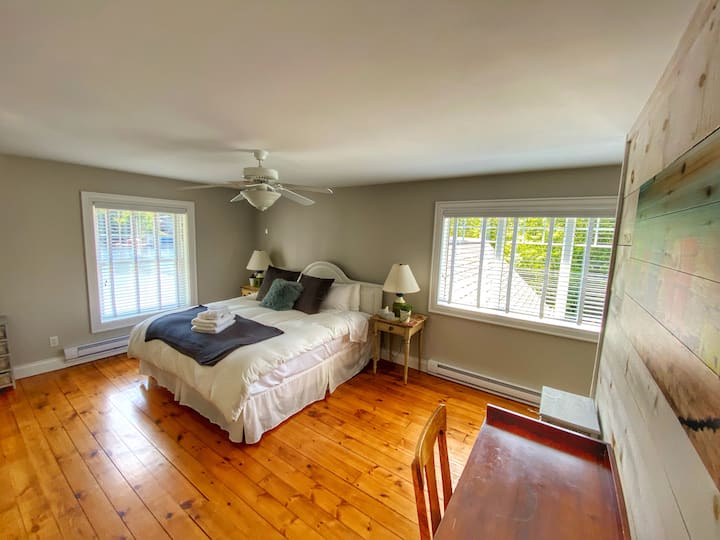 Massive King bed in the upper primary room.