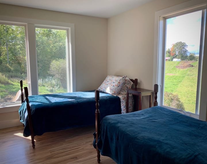 Twin beds, dresser and gorgeous view in Bedroom 3