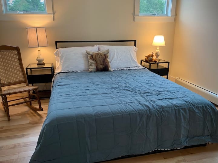First floor Master Bedroom with queen bed and ensuite full bath. Dresser and large closet.