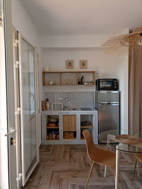 Beach apartment with pool and private parking