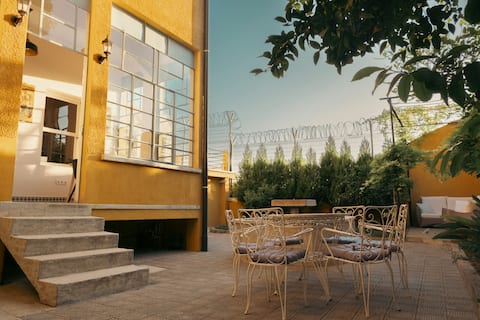 Historical 7-bedroom townhouse in city center.