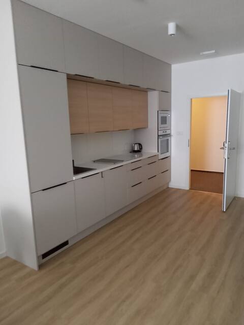 Moderní apartmán až pro 4 osoby, s vlastní kuchyní