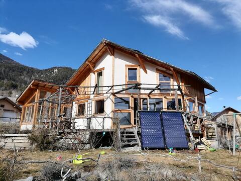 Green house in the mountains
