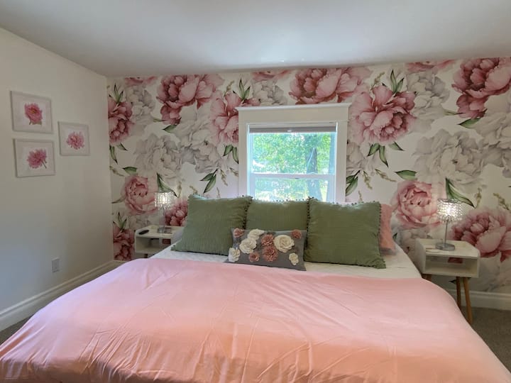 Peony room with comfy King bed and multiple window for those perfect, fresh air sleeping nights.
