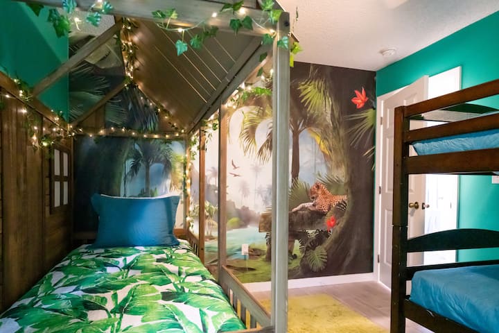 Bedroom 4.  Sleep out in the jungle in this tropical hut!  Additional beds include a bunk bed and fold-away twin, providing a total of 4 twin beds.