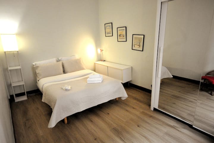 This bedroom, on the upper level of the duplex, can be closed from the rest of the floor. There is a large closet space.