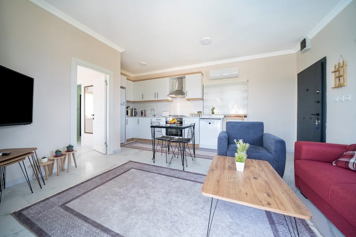 Cragos House ห้องนั่งเล่นห้องครัวและทางเข้าห้องนอน