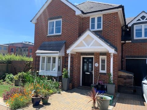 Large, modern 4 bedroom home with free parking.