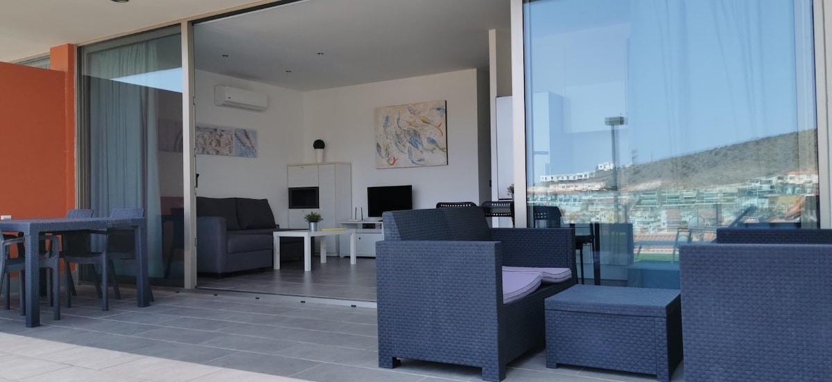 Top Airbnb: A2-Apartment with terrace, pool and sea view à Mogán