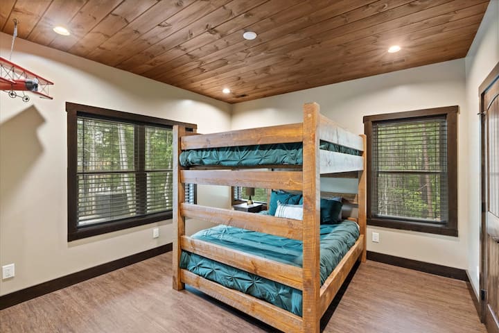 Main level bunkbed room with memory foam mattresses and attached bathroom!
