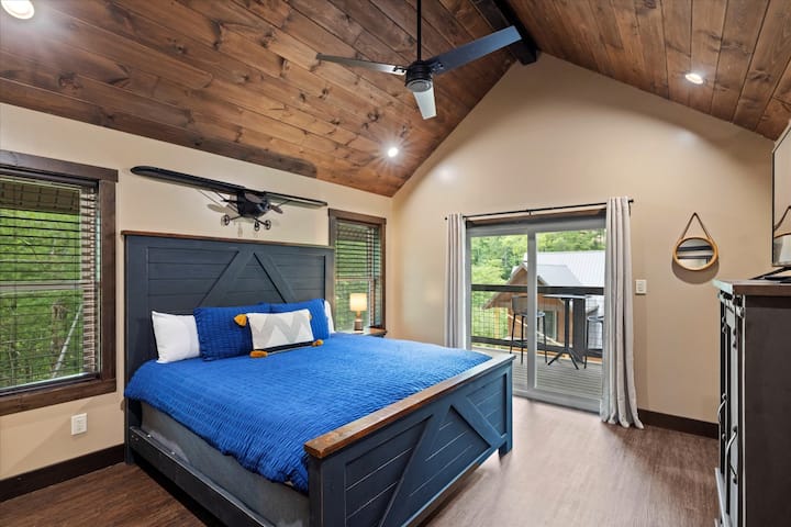 Upper level king bedroom with memory foam mattress, smart TV, private deck & attached bathroom!