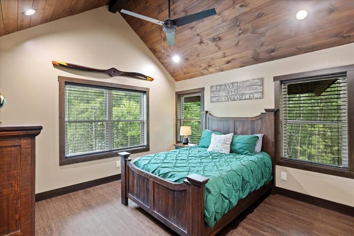 Upper level queen bedroom with memory foam mattress and attached bathroom!