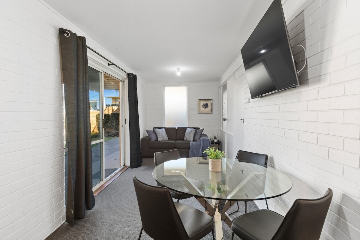 A separate living room downstairs opens directly to the outdoors where groups can spread out.
