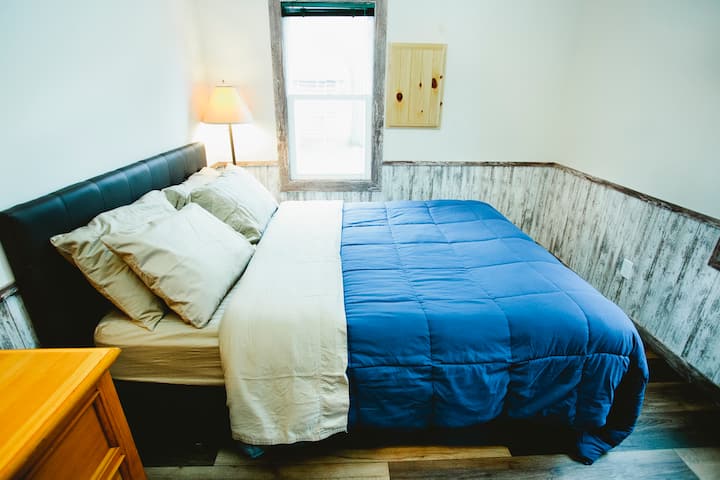 The queen private bedroom with soft comfortable bedding.  Great for sleeping in and enjoying your vacation right with naps!