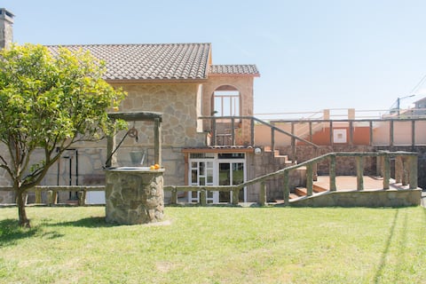 House with garden and large ocean view deck