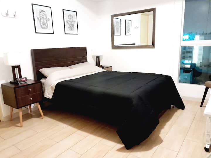 Hoofdslaapkamer - groot bed