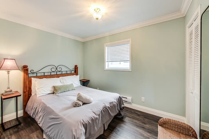 First bedroom with a queen bed