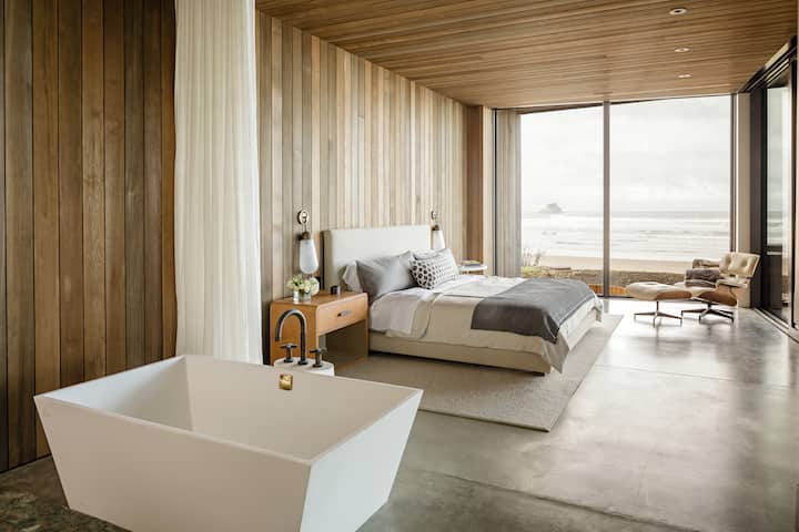 Yeah, she's a beauty. The house comes with automatic shades that are switched on the walls, or operated by remote control at the side of the bed. The master bedroom includes room darkening shades.