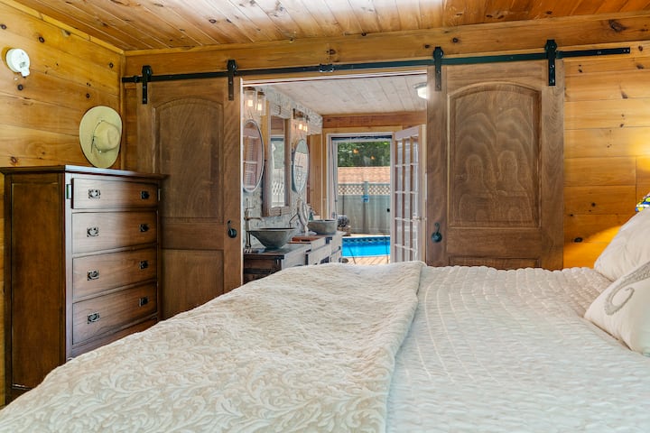 Master bedroom with enuite full bath and walk in closet, walkout to the pool!