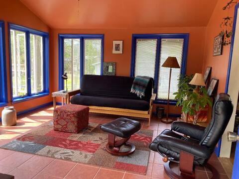 Enjoy our spacious home with a sunroom and patio.