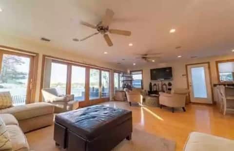 Popular Airbnb listing: Peaceful waterfront home, large deck, 4 bedrooms in Onset