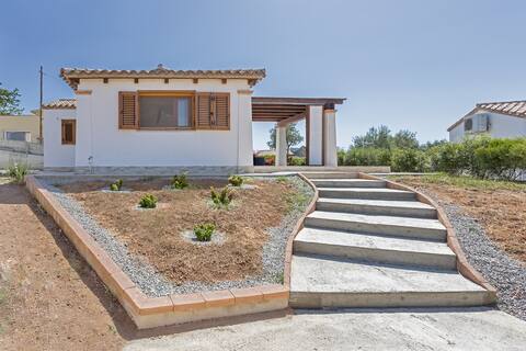 Villa Elisa 
with veranda and garden overlooking the sea