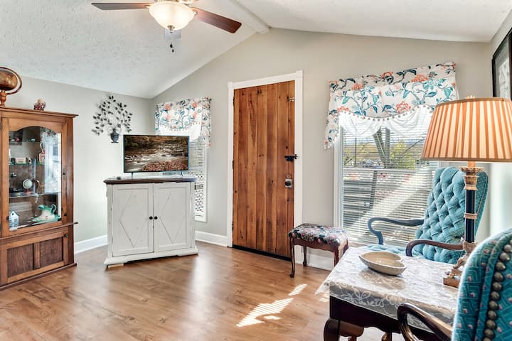 Master bedroom reading nook, Smart TV and electric fireplace with second floor balcony access. 