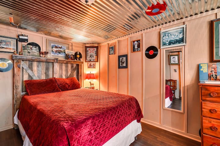 Queen bed with Smart TV in the front bedroom off the living room. 
