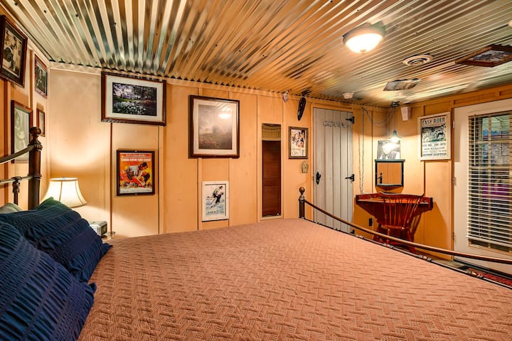 King bed in back bedroom with Smart TV and private access door to the back yard. 