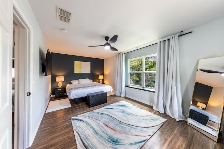 Large bedroom #2 
- 55" smart TV
- 1 King bed and 1 Queen sofa bed   
- Enjoy better & longer sleep with 100% blackout curtains
- Sleep in on a Serta Perfect Sleeper® Charlotte Euro TopSleeper, Official Mattress of the National Sleep Foundation