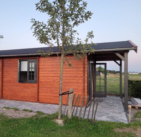 Rural detached log cabin in Noordwijkerhout