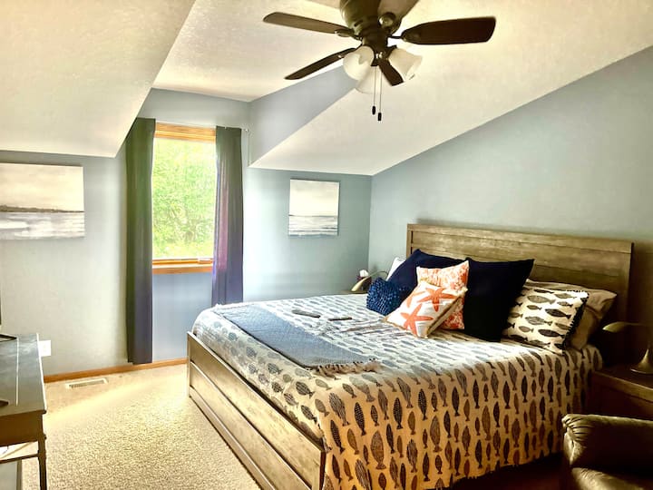 Upstairs bedroom with king bed and TV