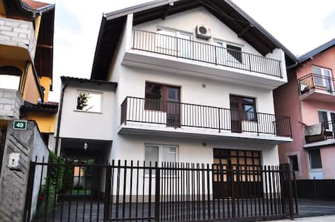 House with tree separate apartments