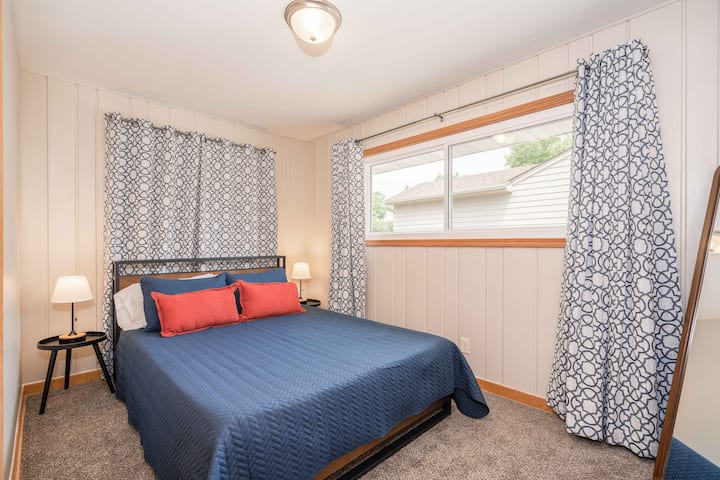 Main level queen with premium mattress and great blackout curtains!