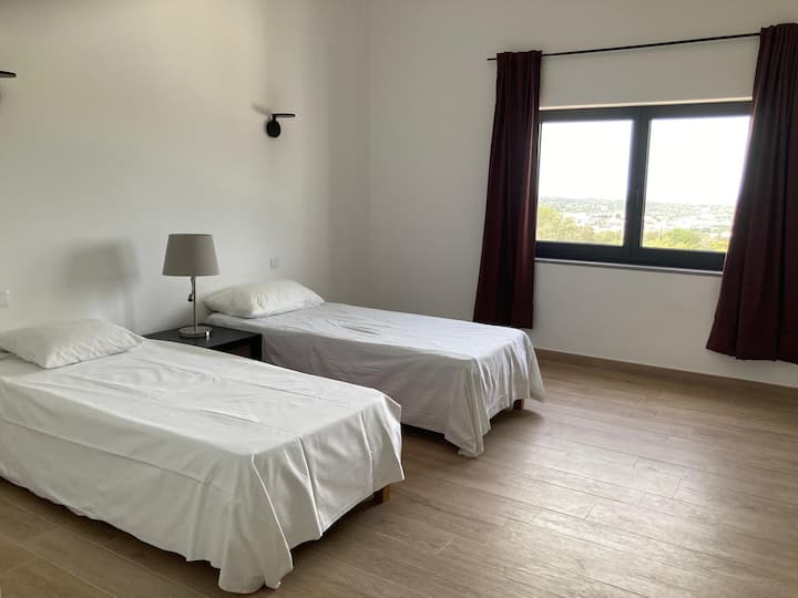 Suite #3 with private bathroom and 2 single beds