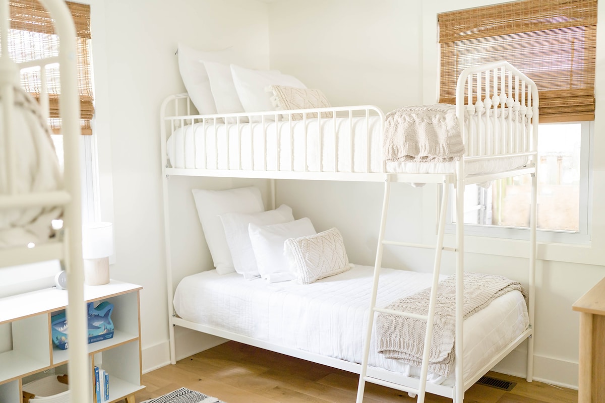 Bunk Room. Sleeps 4. A space for that encourages community for siblings, cousins, or friends to giggle themselves to sleep, to share stories, to relive their memories, or to simply enjoy a good book, puzzle, or game.