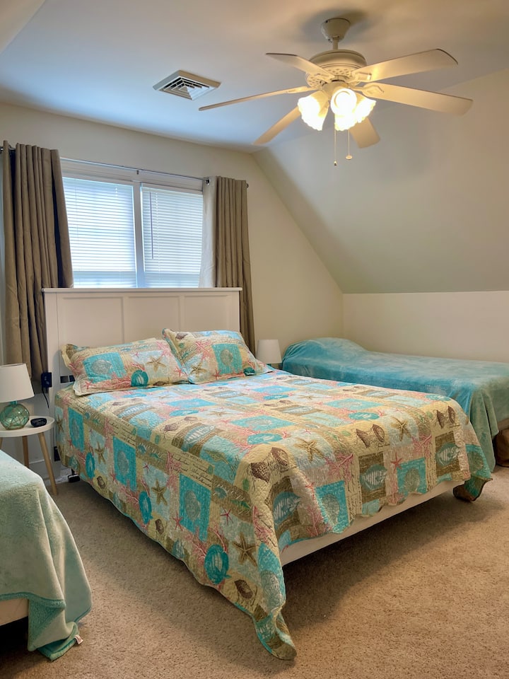 Upstairs with queen and two twin beds