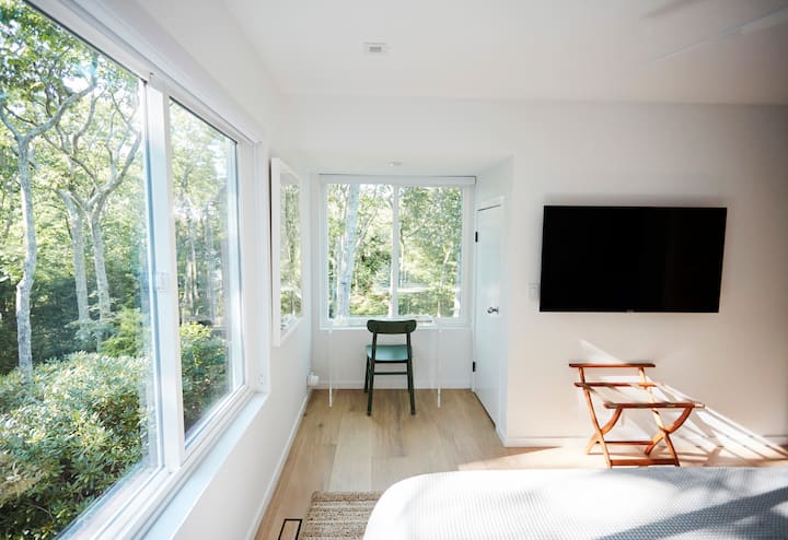 view of work from home space in upstairsnote! this room now has 2 singles if needed. we have it set up as a gym and home office with a with a floor mat which also doubles as a great kids play space.  king bed guest room.
