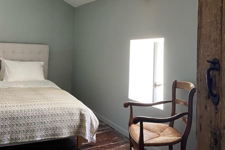 Le Parc: The blue bedroom has a king-size bed with a new Eve mattress. The two bedrooms on the second floor share a shower room across the small hall. 